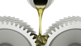 Lubricant Pouring Over Gears